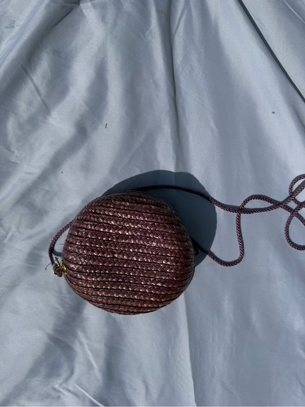 Woven Round Crossbody Bag in Deep Plum